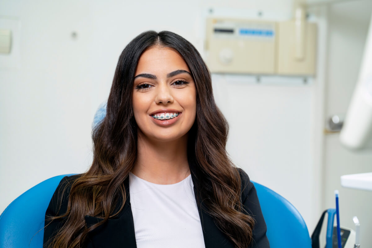 woman with braces in orthodontic setting